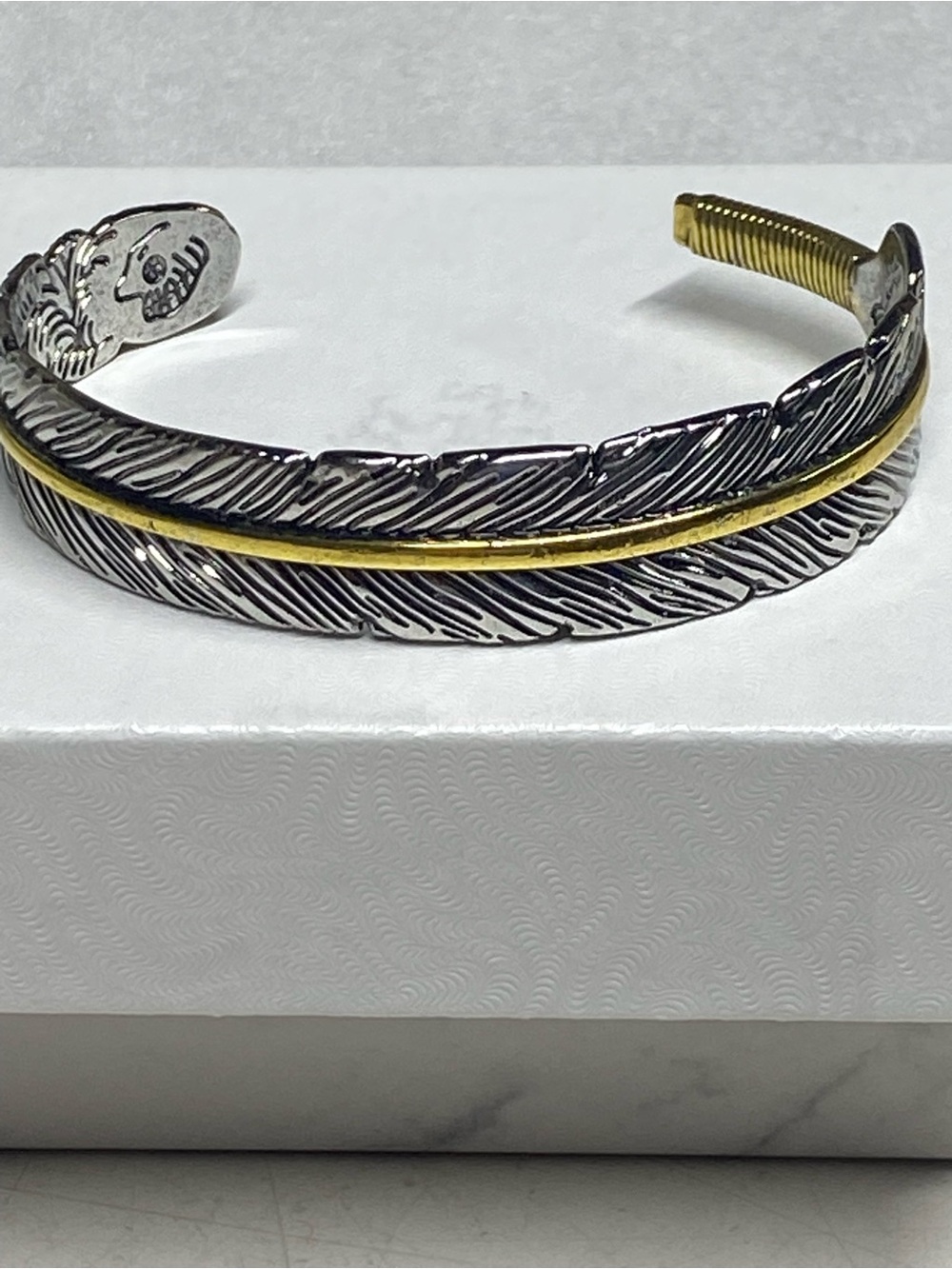 Feather-Textured Silver Cuff Bracelet with Gold Accent